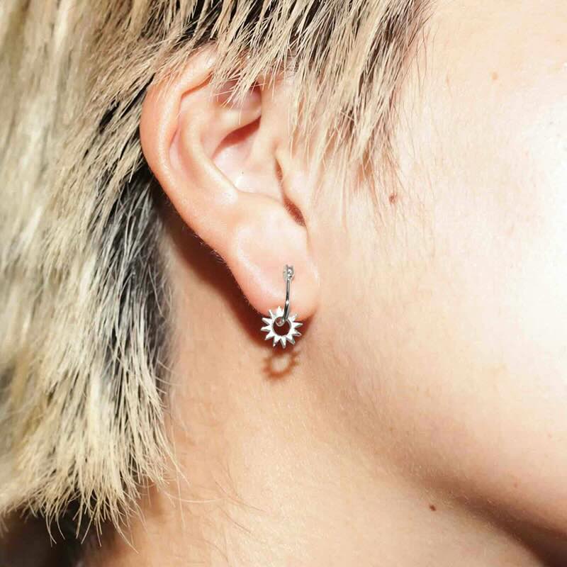 Model wearing Baby Spur Earring in sterling silver