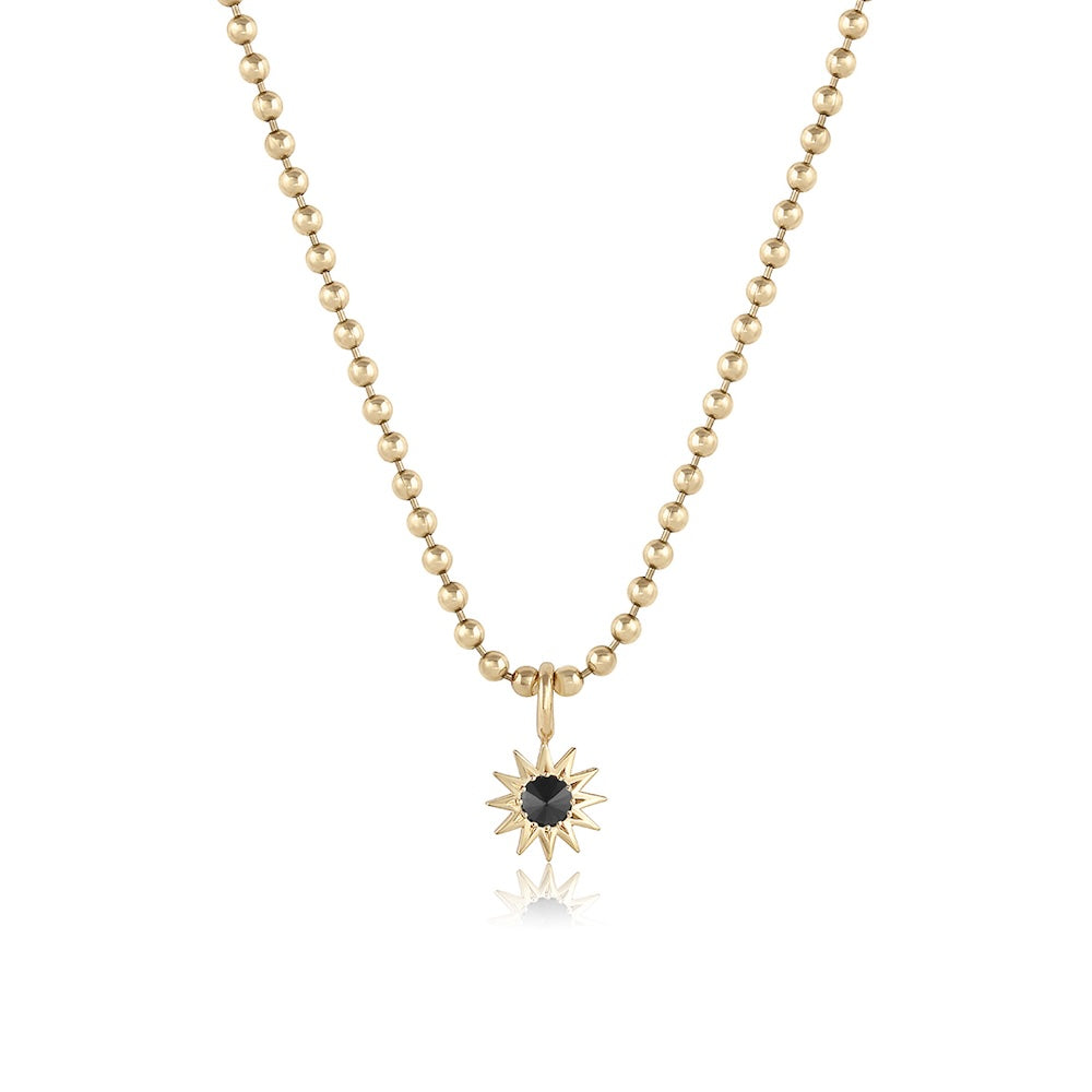 Inverted Diamond Spur Pendant in yellow gold with black diamond, front view