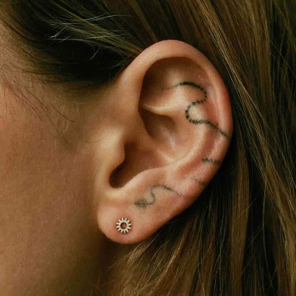 Model wearing Mini Spur Stud in sterling silver