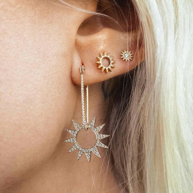 Model wearing Pavé Latch Earring in yellow gold with white pavé diamonds